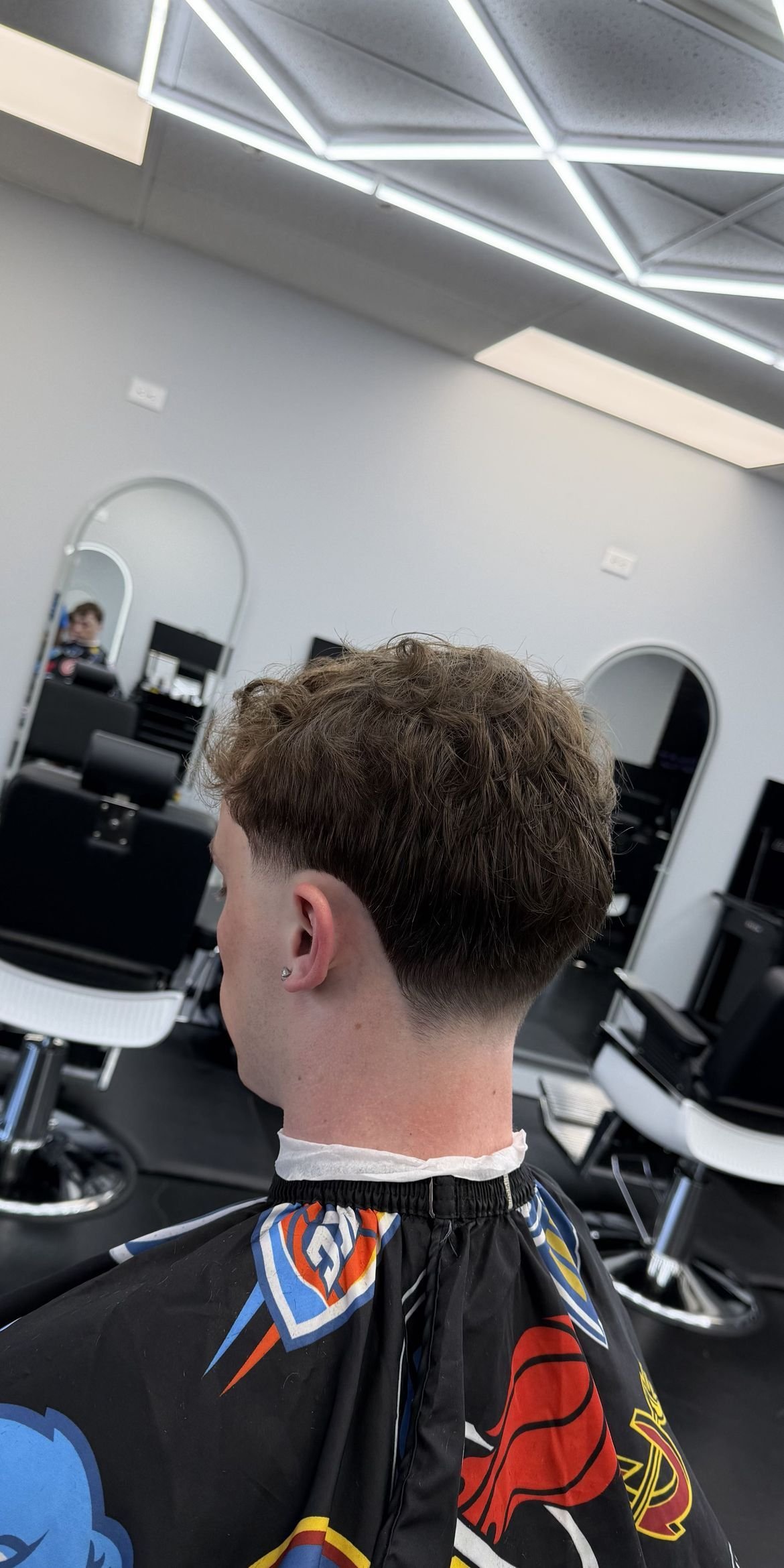 Curly crop with low taper